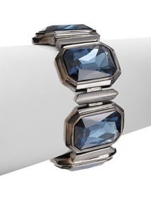 THE LOOKLayered designFaceted Swarovski crystal accentsGunmetal-plated settingMagnetic hinge closureTHE MEASUREMENTWidth, about 1.5ORIGINMade in USA THE LOOKLayered designFaceted Swarovski crystal accentsGunmetal-plated settingMagnetic hinge closureTHE MEASUREMENTWidth, about 1.5ORIGINMade in USA