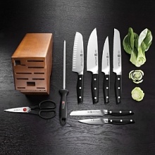 Designed exclusively by Matteo Thun, this gorgeous cutlery is precision forged from a single piece of ice-hardened stainless steel with a unique wedge-shaped blade that gives you optimum stability. The triple-riveted, full-tang handles have a dynamic design that fit neatly in your hand. Set includes: 4 paring/utility, 5 serrated utility, 6 slicing, 8 chef's, 9 sharpening steel, kitchen shears & wood block. Designed exclusively by Matteo Thun, this gorgeous cutlery is precision forged from a single piece of ice-hardened stainless steel with a unique wedge-shaped blade that gives you optimum stability. The triple-riveted, full-tang handles have a dynamic design that fit neatly in your hand. Set includes: 4 paring/utility, 5 serrated utility, 6 slicing, 8 chef's, 9 sharpening steel, kitchen shears & wood block.