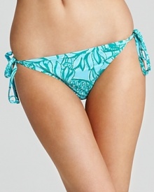 Go (blue) green! The teal hue of this printed bikini from Lilly Pulitzer is universally flattering, while the string ties are ideal for catching rays. Go (blue) green! The teal hue of this printed bikini from Lilly Pulitzer is universally flattering, while the string ties are ideal for catching rays.