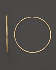 Simply chic, these 14K. yellow gold hoops are timeless classics. Simply chic, these 14K. yellow gold hoops are timeless classics.