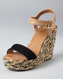 Black, tan and detailed all over, these VINCE CAMUTO wedges have a lot to love. Stitching details at the ankle strap lend a unique touch, while a braided wedge infused with metallic shimmer makes the shoe all-out covetable. Black, tan and detailed all over, these VINCE CAMUTO wedges have a lot to love. Stitching details at the ankle strap lend a unique touch, while a braided wedge infused with metallic shimmer makes the shoe all-out covetable.