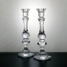 Create a dramatic, stately look with this outstanding set of 11 crystal candlesticks. Weston's profile features a beautifully sculpted spindle design - the perfect accent for any décor. Create a dramatic, stately look with this outstanding set of 11 crystal candlesticks. Weston's profile features a beautifully sculpted spindle design - the perfect accent for any décor.