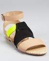 These summer-sporty sandals from Loeffler Randall blend the best trends into one fashion-forward shoe. With neon leather, mesh and raffia details, the Fawn sandal declares itself one of the freshest designs of the season.