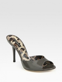 Slip-on glazed leather staple with a skinny heel and peep toe. Self-covered heel, 4 (100mm)Glazed leather upperLeather lining and solePadded insoleMade in ItalyOUR FIT MODEL RECOMMENDS ordering one half size up as this style runs small. Slip-on glazed leather staple with a skinny heel and peep toe. Self-covered heel, 4 (100mm)Glazed leather upperLeather lining and solePadded insoleMade in ItalyOUR FIT MODEL RECOMMENDS ordering one half size up as this style runs small.
