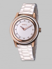 From the Orchestra Collection. A bright timepiece in warm rose goldtone ion-plated stainless steel and shiny ceramic with a dazzling Swarovski crystal markers. Quartz movementWater resistant to 10 ATMRound rose goldtone ion-plated stainless steelcase, 40mm (1.5) Multi-layer stainless steel and rose goldtone ion-plated stainless steel bezelWhite dialSwarovski crystal markersWhite ceramic link braceletImported From the Orchestra Collection. A bright timepiece in warm rose goldtone ion-plated stainless steel and shiny ceramic with a dazzling Swarovski crystal markers. Quartz movementWater resistant to 10 ATMRound rose goldtone ion-plated stainless steelcase, 40mm (1.5) Multi-layer stainless steel and rose goldtone ion-plated stainless steel bezelWhite dialSwarovski crystal markersWhite ceramic link braceletImported