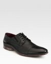 An everyday classic constructed in subtly distressed leather.Leather upperLeather liningPadded insoleRubber soleImported