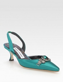 Crystal-encrusted point toe slingback of luxe satin, with a sparkling jeweled embellishment. Self-covered heel, 2½ (65mm)Satin upper with a jeweled-detail and crystalsPoint toeElasticized slingback strapLeather lining and solePadded insoleMade in ItalyOUR FIT MODEL RECOMMENDS ordering one half size up as this style runs small. Crystal-encrusted point toe slingback of luxe satin, with a sparkling jeweled embellishment. Self-covered heel, 2½ (65mm)Satin upper with a jeweled-detail and crystalsPoint toeElasticized slingback strapLeather lining and solePadded insoleMade in ItalyOUR FIT MODEL RECOMMENDS ordering one half size up as this style runs small.