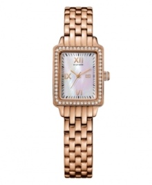 Enchanting excellence from the always sophisticated Tommy Hilfiger. Watch crafted of rose-gold tone stainless steel bracelet and rectangular case. Bezel crystallized with Swarovski elements. Mother-of-pearl dial features rose-gold tone Roman numerals at twelve, nine and six o'clock, minute track, three hands, and logo. Quartz movement. Water resistant to 30 meters. Ten-year limited warranty. Enchanting excellence from the always sophisticated Tommy Hilfiger. Watch crafted of rose-gold tone stainless steel bracelet and rectangular case. Bezel crystallized with Swarovski elements. Mother-of-pearl dial features rose-gold tone Roman numerals at twelve, nine and six o'clock, minute track, three hands, and logo. Quartz movement. Water resistant to 30 meters. Ten-year limited warranty.