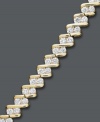 Exquisite shape and plenty of sparkle! Surprise her with this stunning tennis bracelet. A chic diagonal design with sparkling round-cut diamonds (1 ct. t.w.) will make quite the impact. Crafted in 10k gold. Approximate length: 7-1/2 inches.