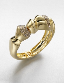 From the Miss Havisham Collection. A bold, golden bangle with a chunky sculptural shape, and bands encrusted with dazzling Swarovski crystals.CrystalGoldtoneDiameter, about 2.5Width, about .75Hinged, with magnetic closureImported From the Miss Havisham Collection. A bold, golden bangle with a chunky sculptural shape, and bands encrusted with dazzling Swarovski crystals.CrystalGoldtoneDiameter, about 2.5Width, about .75Hinged, with magnetic closureImported