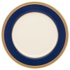 Inspired by privately commissioned presidential dinnerware, this fine china features stately navy bands and a gold border etched with patriotic stars.