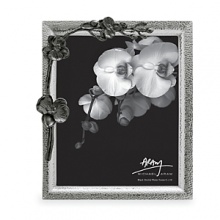 The Black Orchid Collection takes its inspiration from the intricacies of form and texture found in foliage from around the world. By interpreting plant forms in cast metal, Aram presents work which is evocative of a natural environment transformed and redefined. Each piece is an intimate expression of Aram's individual creativity as well as an object of infinite and timeless meaning. The Black Orchid Collection takes its inspiration from the intricacies of form and texture found in foliage from around the world. By interpreting plant forms in cast metal, Aram presents work which is evocative of a natural environment transformed and redefined. Each piece is an intimate expression of Aram's individual creativity as well as an object of infinite and timeless meaning.
