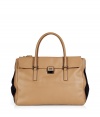 Tote around your daily essentials in style with this luxe neutral shopper from cult favorite Anya Hindmarch - Rectangular shape, carrying handles, front flap with logo detailed closure, contrasting black side detail - Perfect for daily use or for casual cocktails with the girls