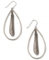 Your new fine feathered friends. These hoop earrings from Lucky Brand are styled in an oblong design with a feather pendant at the center. Crafted in silver tone mixed metal. Approximate drop: 2-1/4 inches.
