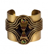 Stylish cuff from cult New York accessories label Dannijo - Handmade in the U.S. of oxidized brass and Swarovski Elements - Malleable style can be squeezed or widened to fit the wrist - Approximately 2.5 wide and 2 long - A sophisticated statement piece that adds instant chic to any outfit - Truly versatile, easily paired with both day and evening looks