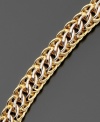 Classic 14k gold over sterling silver mesh links are accented with complementary shining sterling silver links on this wear-everywhere bracelet. Approximate length: 7-1/2 inches.