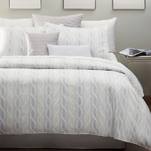 Like a festooned curtain that unfolds to soft sheets of shimmering motifs, Curtain Call sets the stage for the bed of your dreams with its multi-tones of fresh blue and white. Embroidered and quilted pillows are the supporting cast for this melodic ensemble. Like a festooned curtain that unfolds to soft sheets of shimmering motifs, Curtain Call sets the stage for the bed of your dreams with its multi-tones of fresh blue and white. Embroidered and quilted pillows are the supporting cast for this melodic ensemble.