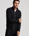 Keep out the chill with this BOSS Black wool zip sweater featuring contrast stitching.