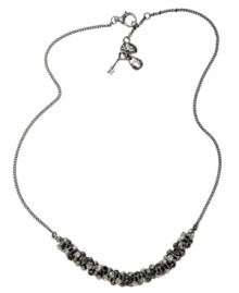Simple yet stunning. A sparkling row of black crystals adorns this chic chain necklace from Fossil. Crafted in ruthenium tone mixed metal, it includes a lobster claw closure. Approximate length: 18 inches + 2-inch extender. Simple yet stunning. A sparkling row of black crystals adorns this chic chain necklace from Fossil. Crafted in ruthenium tone mixed metal, it includes a lobster claw closure. Approximate length: 18 inches + 2-inch extender.