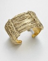 Simply stunning, this richly textured open cuff is formed of wrapped golden ropes for endless gleam and glamour.GoldplatedDiameter, about 2.7Width, about 1.6Made in France