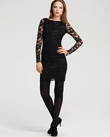This lace DIANE von FURSTENBERG dress gets a glamorous lift from metallic floral embellishments throughout the sheer silhouette for a luxurious style statement. This lace DIANE von FURSTENBERG dress gets a glamorous lift from metallic floral embellishments throughout the sheer silhouette for a luxurious style statement.