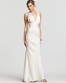 Exude old Hollywood glamour in this silky floor-sweeping gown from Nicole Miller. Classically elegant with a dash of sultry appeal. Exude old Hollywood glamour in this silky floor-sweeping gown from Nicole Miller. Classically elegant with a dash of sultry appeal.