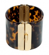 Stylish bangle from hot New York designer Marc Jacobs - In elegant tortoise - Fine, gold-colored hinged clasp (fits on either arm) - Crazy decorative and dressy - A mega glamorous color accent for fall - Wide shape - A super highlight piece for day and evening - An easy instant upgrade - goes with a sexy top, business suit, equestrienne look as well as a cocktail dress