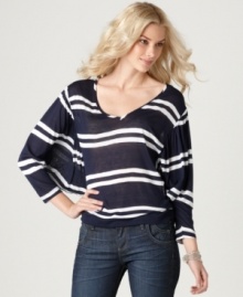 Spring forward into a chic, relaxed look in this Kut from the Kloth top! Semi-sheer fabric lends a breezy vibe to this lightweight essential. Spring forward into a chic, relaxed look in this Kut from the Kloth top! Semi-sheer fabric lends a breezy vibe to this lightweight essential.