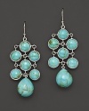 Turquoise cabochons brighten sterling silver. By Elizabeth Showers.