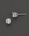 Diamond stud earrings in 18K white gold.