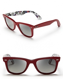 These seemingly classic Ray-Ban Wayfarers have a secret party going on; the inside frames feature a fun print with a London motif. These seemingly classic Ray-Ban Wayfarers have a secret party going on; the inside frames feature a fun print with a London motif.