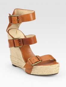 Classic espadrille wedge topped with a trio of adjustable leather straps. Hemp wedge, 5 (125mm)Hemp platform, 1 (25mm)Compares to a 4 heel (100mm)Leather upperLeather lining and solePadded insoleMade in ItalyOUR FIT MODEL RECOMMENDS ordering true size. Classic espadrille wedge topped with a trio of adjustable leather straps. Hemp wedge, 5 (125mm)Hemp platform, 1 (25mm)Compares to a 4 heel (100mm)Leather upperLeather lining and solePadded insoleMade in ItalyOUR FIT MODEL RECOMMENDS ordering true size.