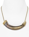 Inject House of Harlow 1960's edgy, bohemian glamor into your accessories portfolio with this 14-karat gold necklace, accented by a bold, engraved horn.