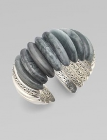 This exceptional cuff design circles the wrist with agate stones and sterling silver.Agate Sterling silver Width, about 1½Diameter, about 2Made in Bali This exceptional cuff design circles the wrist with agate stones and sterling silver.Agate Sterling silver Width, about 1½Diameter, about 2Made in Bali
