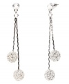 Sparkling and stunning! Featuring a glittering glass accent and crystal fireball design, Monet's linear drop earrings evoke elegance and glamour. Crafted in silver tone mixed metal, they're a dazzling decorative detail for your evening look. Approximate drop: 1-7/8 inches.