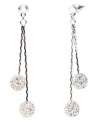 Sparkling and stunning! Featuring a glittering glass accent and crystal fireball design, Monet's linear drop earrings evoke elegance and glamour. Crafted in silver tone mixed metal, they're a dazzling decorative detail for your evening look. Approximate drop: 1-7/8 inches.