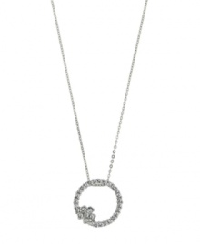 Eternal design accented by just the right amount of sparkle. 2028 pendant features a cut-out circular style accented by a chic flower and acrylic stones. Setting and chain crafted in silver tone mixed metal. Approximate length: 16 inches + 3-inch extender. Approximate drop: 1-1/4 inches. Eternal design accented by just the right amount of sparkle. 2028 pendant features a cut-out circular style accented by a chic flower and acrylic stones. Setting and chain crafted in silver tone mixed metal. Approximate length: 16 inches + 3-inch extender. Approximate drop: 1-1/4 inches.