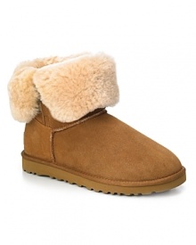 UGG® Australia suede ankle boots with genuine shearling lining will keep your feet in ultimate comfort. Shearling cuff can be worn up or down for a more versatile look. Functional elastic loop and button at side and rubber wafer sole. UGG® Australia suede ankle boots with genuine shearling lining will keep your feet in ultimate comfort. Shearling cuff can be worn up or down for a more versatile look. Functional elastic loop and button at side and rubber wafer sole.