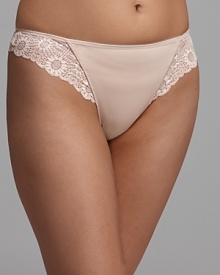 This tanga provides coverage in between thong and bikini with aloe vera infused lace for ultimate smooth comfort. Style #12J710 This tanga provides coverage in between thong and bikini with aloe vera infused lace for ultimate smooth comfort. Style #12J710
