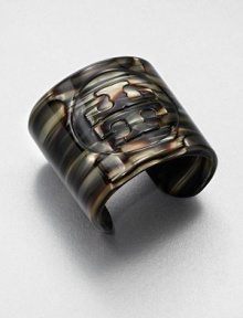 A subtle logo embossed on a wide resin design. ResinLength, about 8Slip-on styleImported A subtle logo embossed on a wide resin design. ResinLength, about 8Slip-on styleImported
