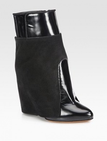 A concealed wedge lifts this leather and suede ankle boot for modern appeal. Hidden stacked wedge, 5 (125mm)Leather and suede upperPull-on styleLeather lining and solePadded insoleMade in Italy A concealed wedge lifts this leather and suede ankle boot for modern appeal. Hidden stacked wedge, 5 (125mm)Leather and suede upperPull-on styleLeather lining and solePadded insoleMade in Italy