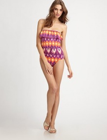 Big, bold color creates an eye-catching backdrop for this ultra-feminine, ultra-chic swim style. Ruffled bandeau topSupportive shelf braDrawstring waistFully lined80% nylon/20% spandexHand washMade in USA of Italian fabric