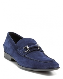 No one steps on these Salvatore Ferragamo loafers: your go-to blue suede shoes rock silver-tone accents for effortless posh.