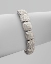 EXCLUSIVELY AT SAKS. This endless dazzle pf pavé crystal squares surrounds your wrist exquisitely.CrystalRhodium platedLength, about 7¼Push-lock claspImported