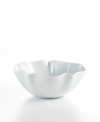This multi-purpose bowl does it all, transitioning smoothly from the oven or microwave and into the dishwasher. A ruffled edge adds a touch of whimsy to timeless white porcelain.