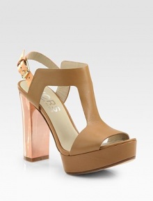 Rich, structured leather t-strap with an adjustable metallic ankle strap and glossy patent leather heel. Patent leather-covered heel, 5 (125mm)Covered platform, 1 (25mm)Compares to a 4 heel (100mm)Leather and metallic leather upperLeather liningBuffed leather solePadded insoleImported