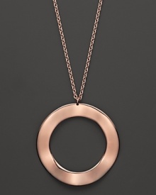 An elegant rose silver circular pendant on a fine chain from Ippolita. An elegant rose silver circular pendant on a fine chain from Ippolita.