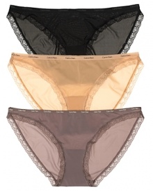 A basic bikini with intricate lace trim and logo stamped waistband. Style #D3447 A basic bikini with intricate lace trim and logo stamped waistband. Style #D3447