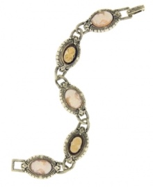 Cameo appearance. 2028's chain link bracelet features vintage inspiration in the form of a cameo motif. Crafted in brass tone mixed metal, opaque resin, and vintage German glass stones, it's sure to add a romantic sense of antique chic to your style. Approximate length: 7 inches. Cameo appearance. 2028's chain link bracelet features vintage inspiration in the form of a cameo motif. Crafted in brass tone mixed metal, opaque resin, and vintage German glass stones, it's sure to add a romantic sense of antique chic to your style. Approximate length: 7 inches.