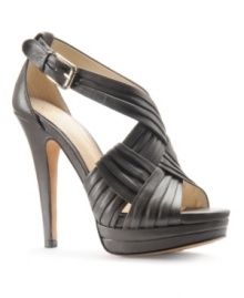 The Isola Damar Sandals add fashion details to every inch with their pleated and woven straps, closed ankle and shapely platform. The Isola Damar Sandals add fashion details to every inch with their pleated and woven straps, closed ankle and shapely platform.